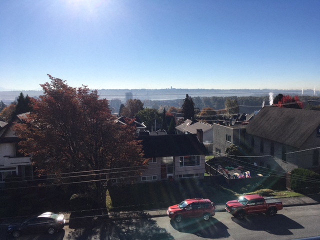 the view of the city from the roof of a house